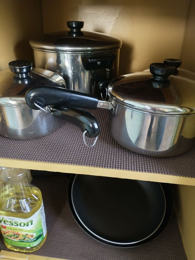 Fully stocked kitchen with plenty of pans