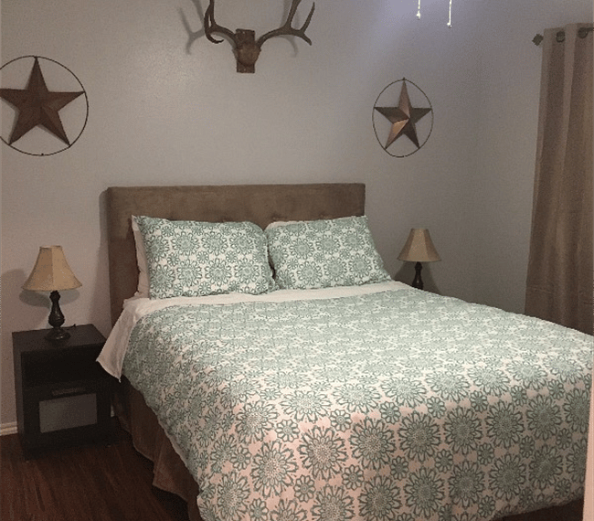 Guest bedroom #3 with Queen Bed and dresser for plenty of storage.