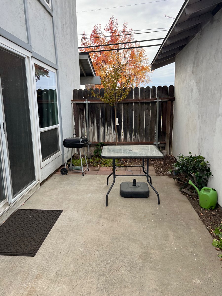 Small patio area / seasonal table, chairs and umbrella