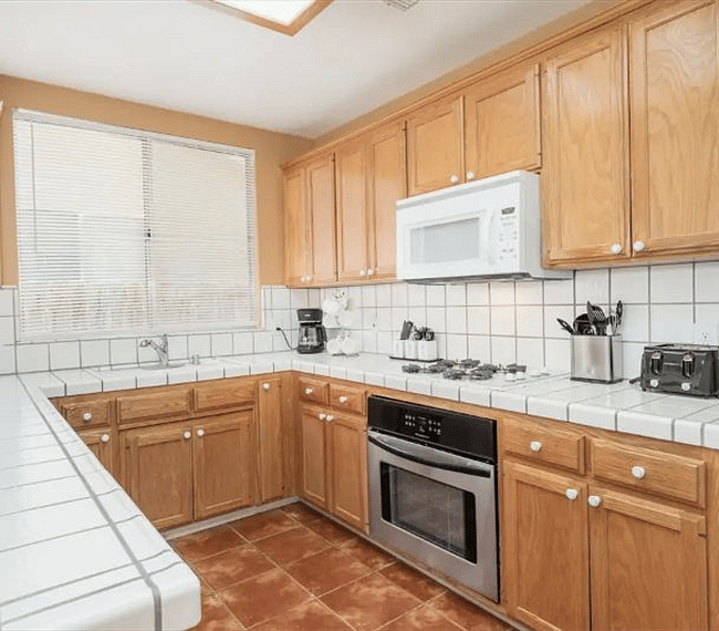 Fully stocked kitchen with updated appliances
