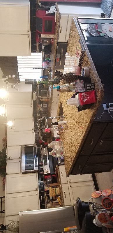 Fully equipped kitchen with Island, two kitchen sinks and all of the cooking supplies you can dream of.