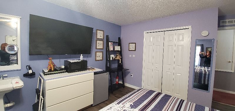 This is one of our four bedrooms, "New King Room" each with their own private restroom and showers. This particular room is Room E and features a king size, adjustable bed and pull out couch.