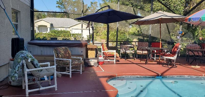 Our large 1800 sf pool area has cushioned seating for 20, large pool, hot tub and is a great place to relax or work.