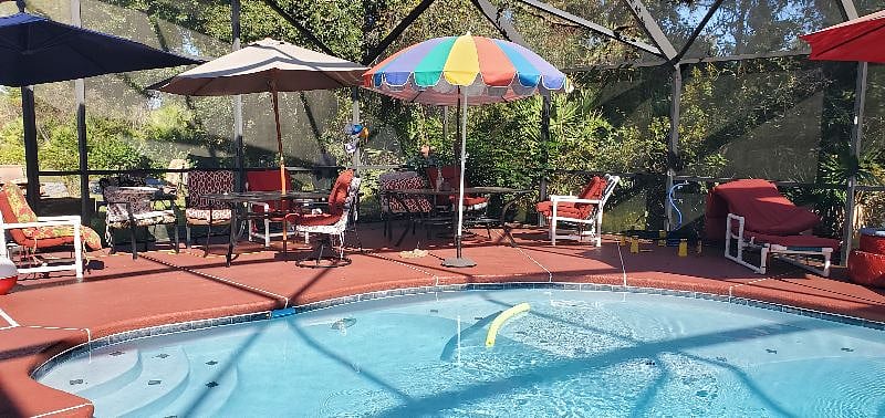 Our large 1800 sf pool area has cushioned seating for 20, large pool, hot tub and is a great place to relax or work.