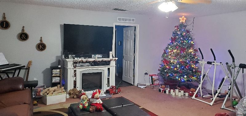 Our family room is one of three public areas in our home to relax. We have this family room with large screen TV, a living room and another family relaxing type open bonus room on the second floor, also with a large screen tv.