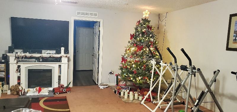 Our family room is one of three public areas in our home to relax. We have this family room with large screen TV, a living room and another family relaxing type open bonus room on the second floor, also with a large screen tv.
