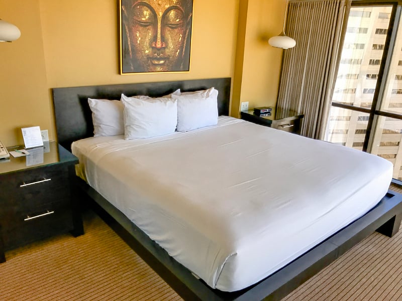 Plush king size bed with all bedding.