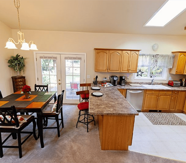 Dining, Kitchen, and French door to back porch