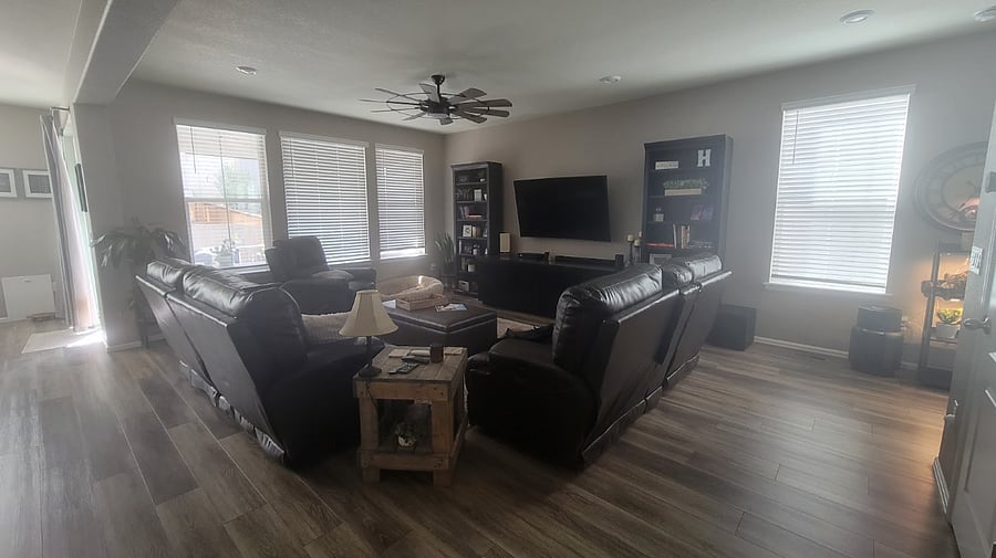 Livingroom with recliners and smart TV