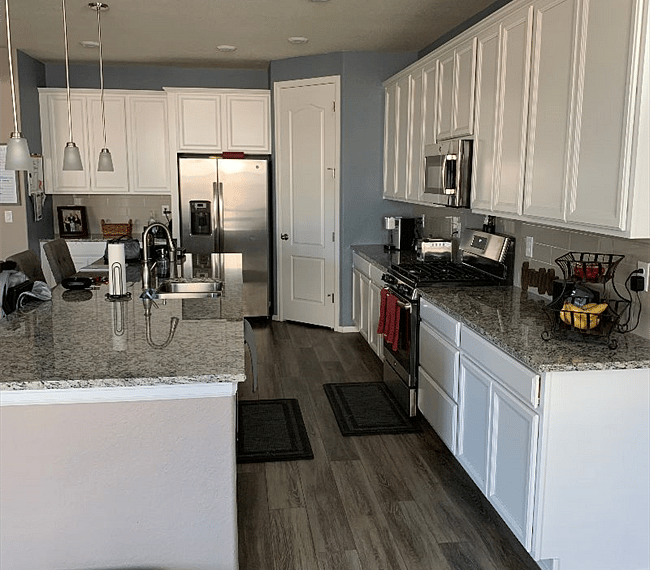 Fully stocked kitchen with updated appliances
