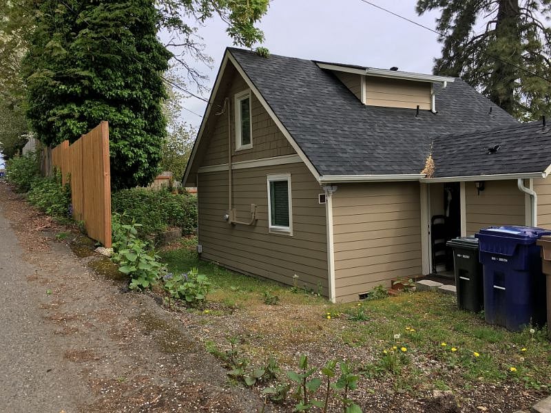 The back of the house, view is from the back alley area.