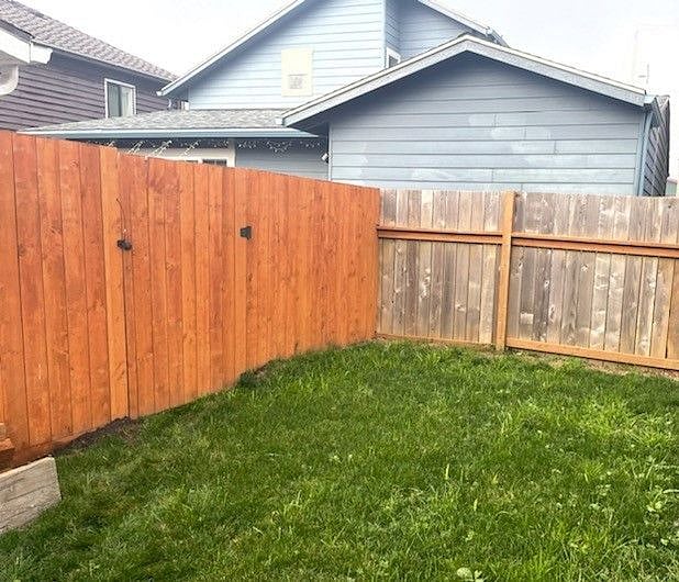 Fully fenced backyard is great for pets.