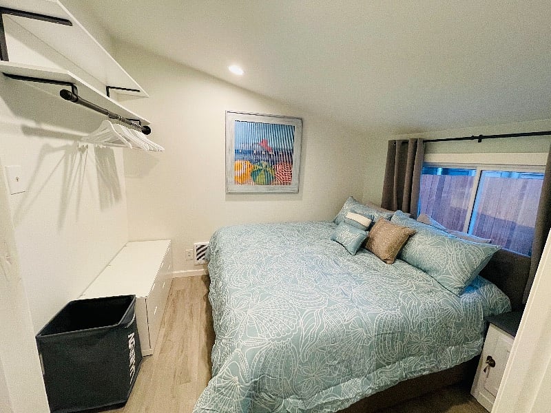 Master bedroom with custom storage area.