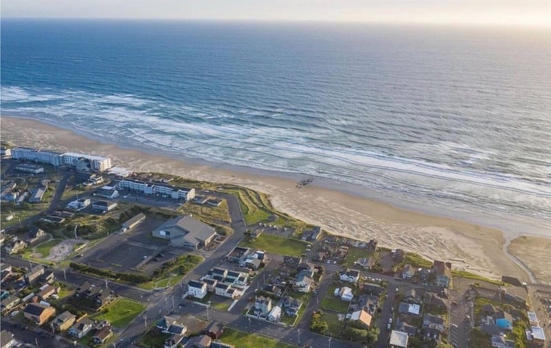 A beautiful sandy beach provides unparalleled beauty of the Oregon coast line