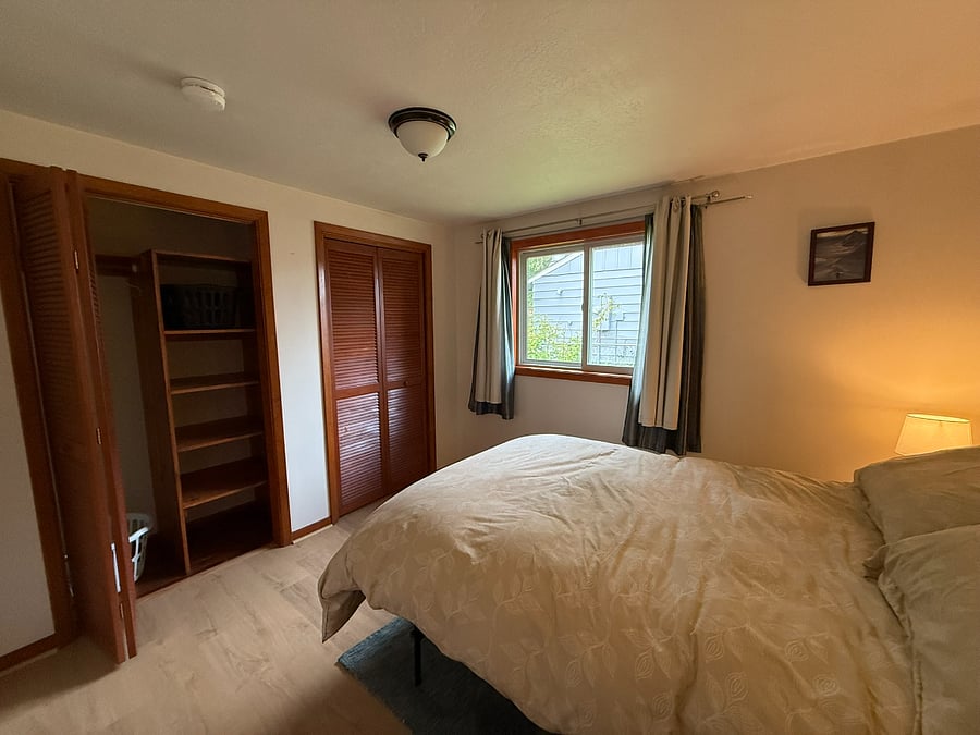 Smaller Bedroom with a lot of closet space.