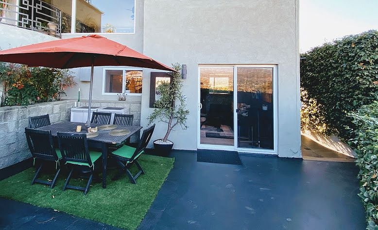 Front entrance and dining patio for apartment.