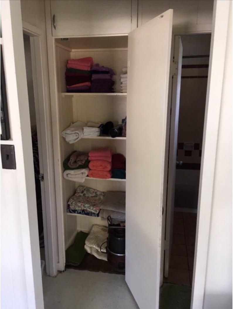 Linen closet, between the bedroom and bathroom 