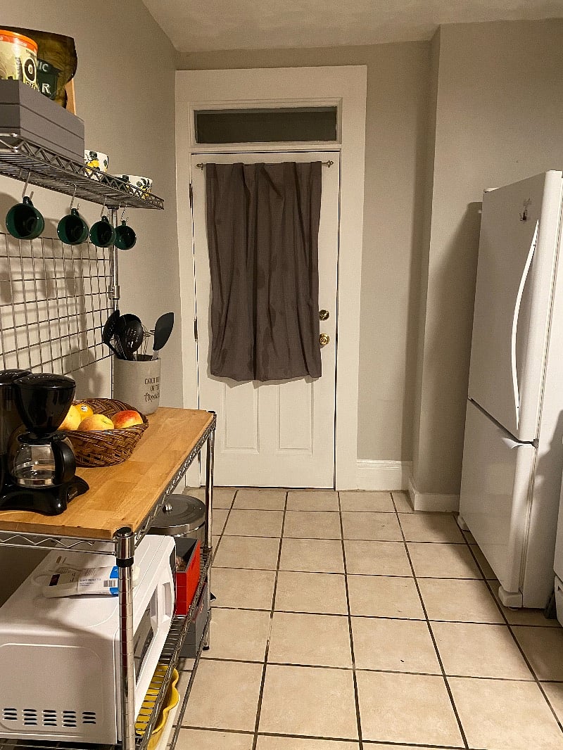 The back door leads to second exit off a porch. 