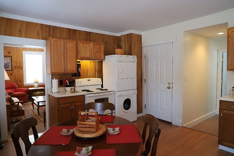 Unit B, entrance is to the right of the W/D.