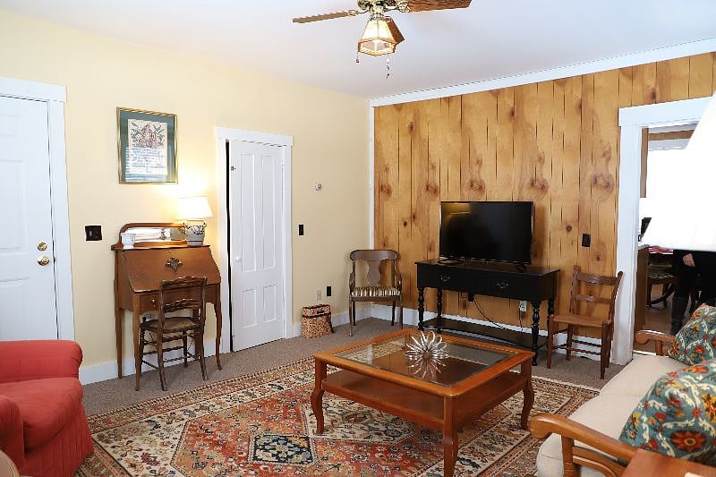 Unit B 7th View with desk, closet and TV