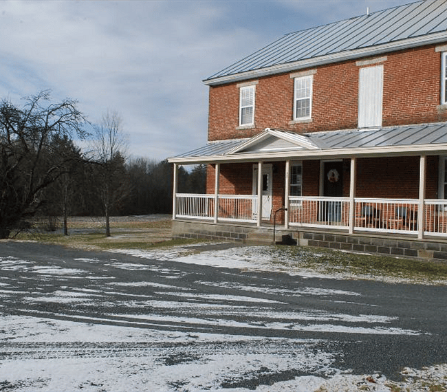 Front of the building with off street parking 