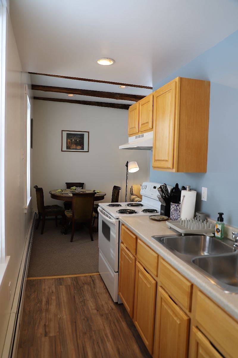 Unit C view from kitchen back to dining area