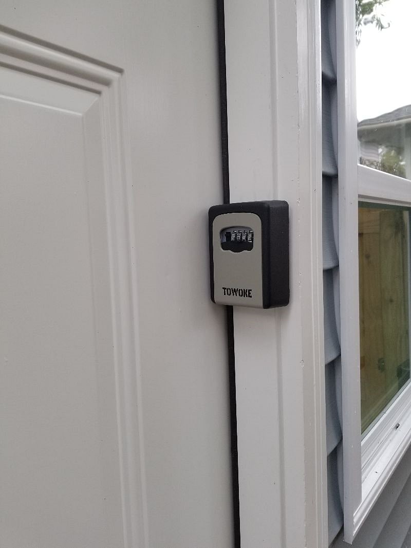 combo lock-box w/key, providing easy entry w/o personal interaction