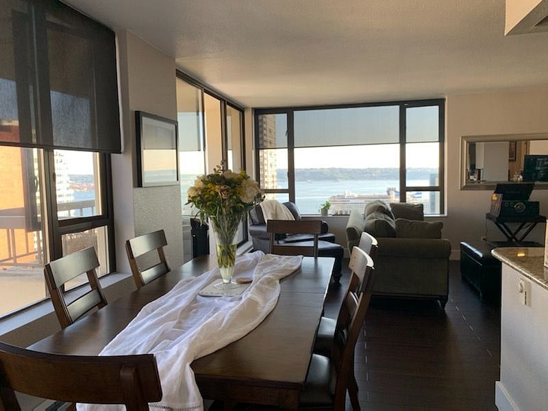 Common dining area and living room with view of Puget sound