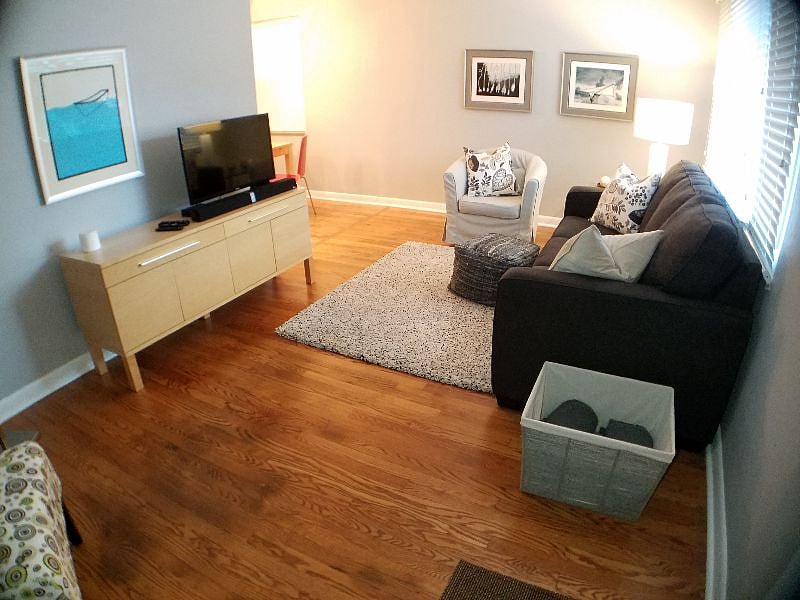 Living room and TV, opens to eating area