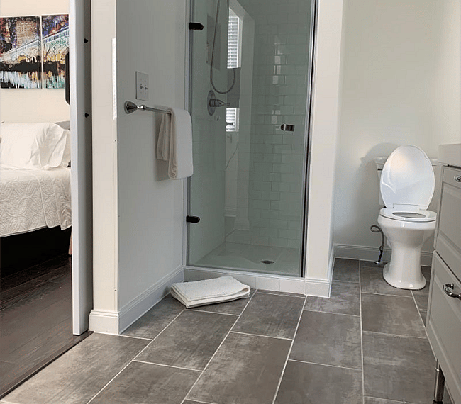 A walk-in shower features in the bathroom 
