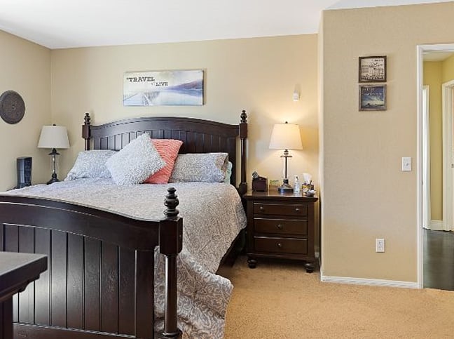 Spacious and bright bedroom with queen bed