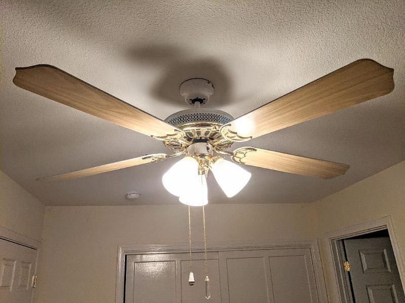 Ceiling fan in bedroom.