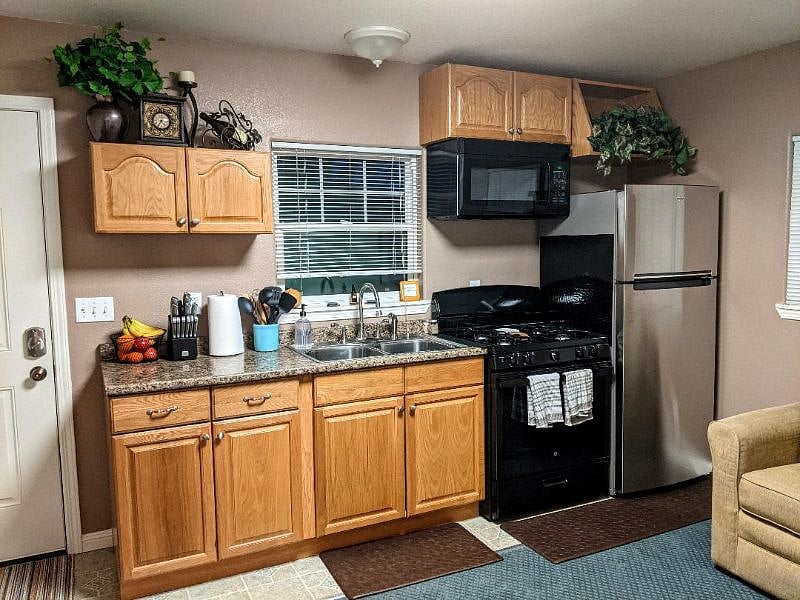 Fully remodeled kitchen with new microwave, stove/oven/refrigerator.