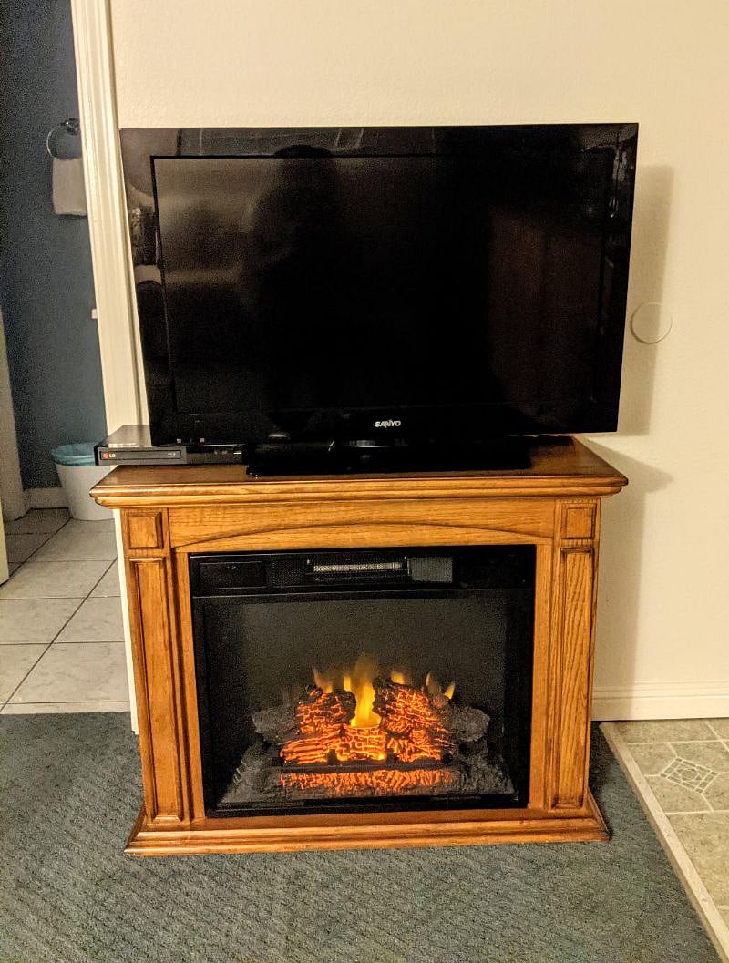 Faux Fireplace and Electric Heather for a Cozy Ambience.