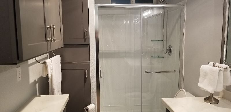 Spacious Walk in Shower with Lots of Storage for your Essentials.