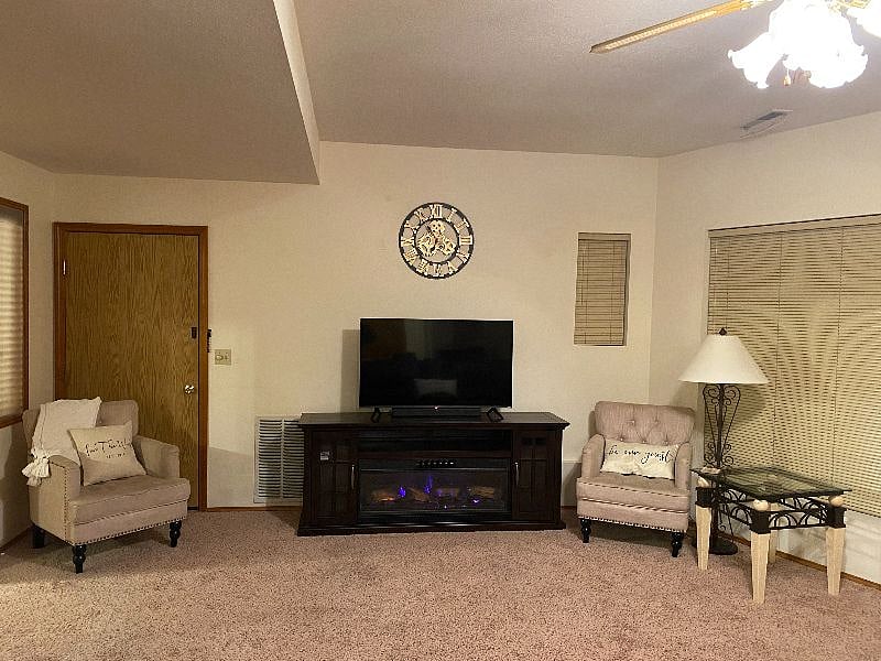Electric Fireplace with 55 inch Roku TV for your Entertainment Pleasure with a Sound Bar