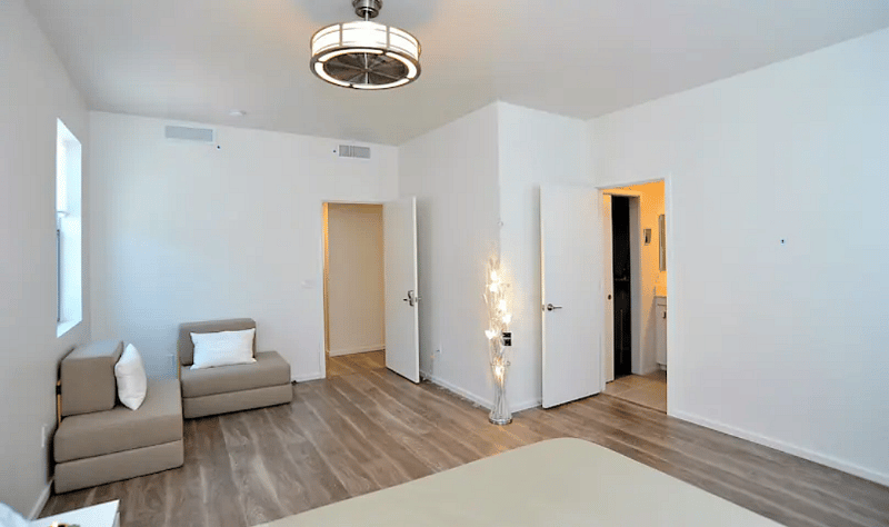 The bedroom has the en suite bathroom and walk-in closet.