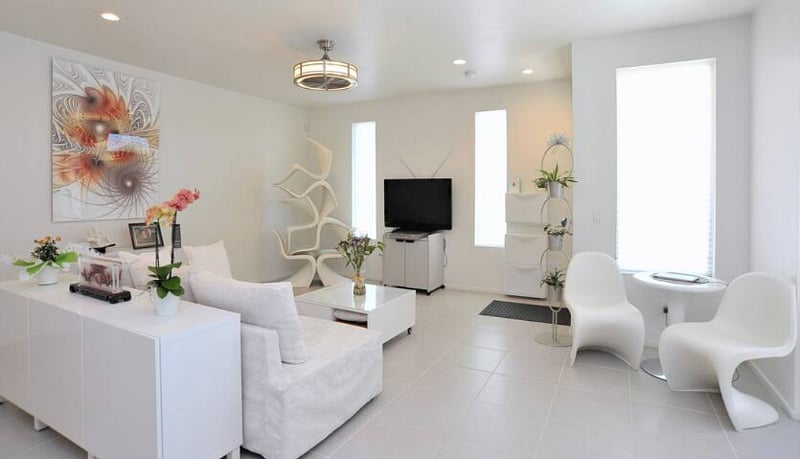 Those stacked Vitra Panton S chairs at the corner can be used on the patio.