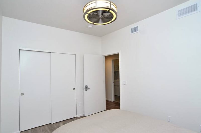 Large wall closet. Hangers, shoe rack and extra room heater are provided.