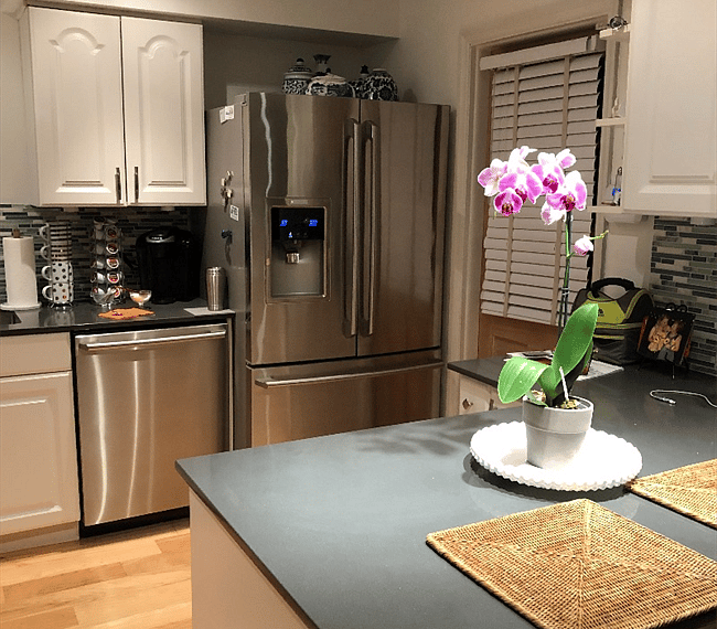 Kitchen including fridge. Freezer, stove, oven and microwave. Additional items like Blender, Kuerig, and tea pot are there for you to use.