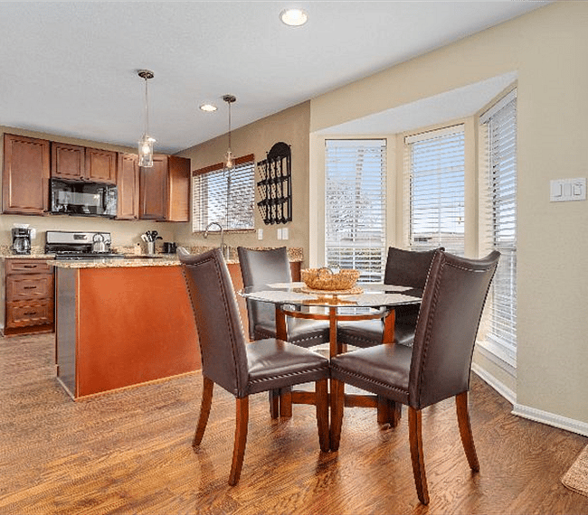 Breakfast dining nook seats four and is located between the kitchen and the Family Room.