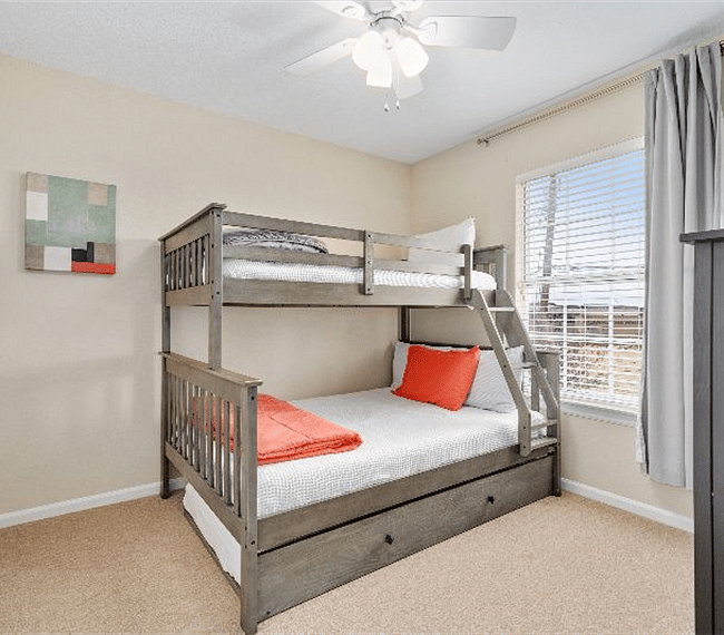 Guest Bedroom 2 with bunk bed set up. Twin on the top, full size on the bottom and twin pull out trundle bed. Easily sleeps up to 4 guests.
