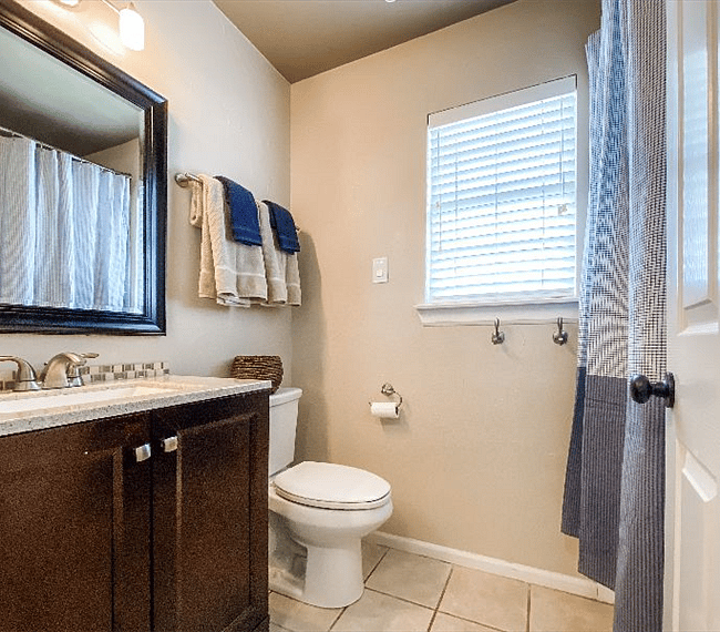 Guest Bathroom with tub/shower combination.