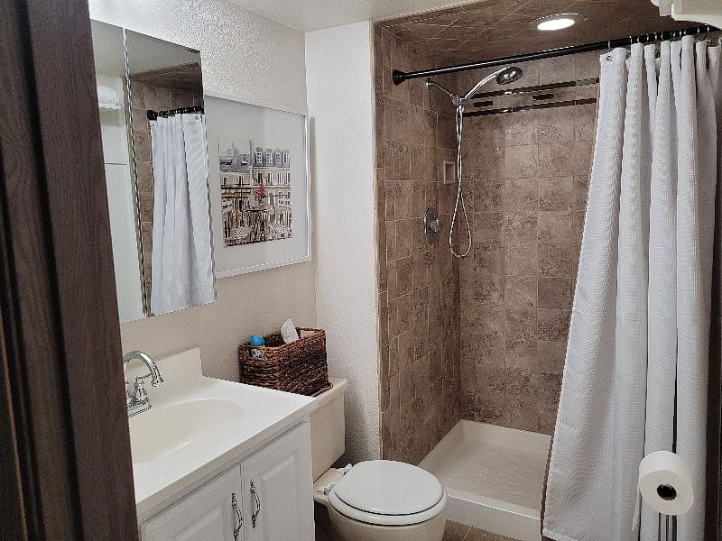 Bathroom, tiled shower with seating