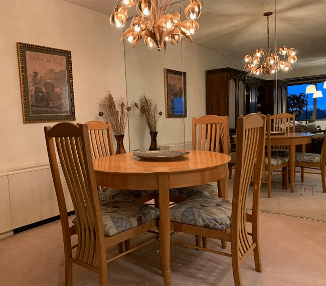 Dining room table expands to seat six