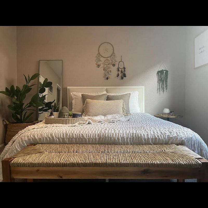 The guest bedroom features a queen sized bed on a memory foam mattress, full length mirror and spacious walk in closet that includes shelving.