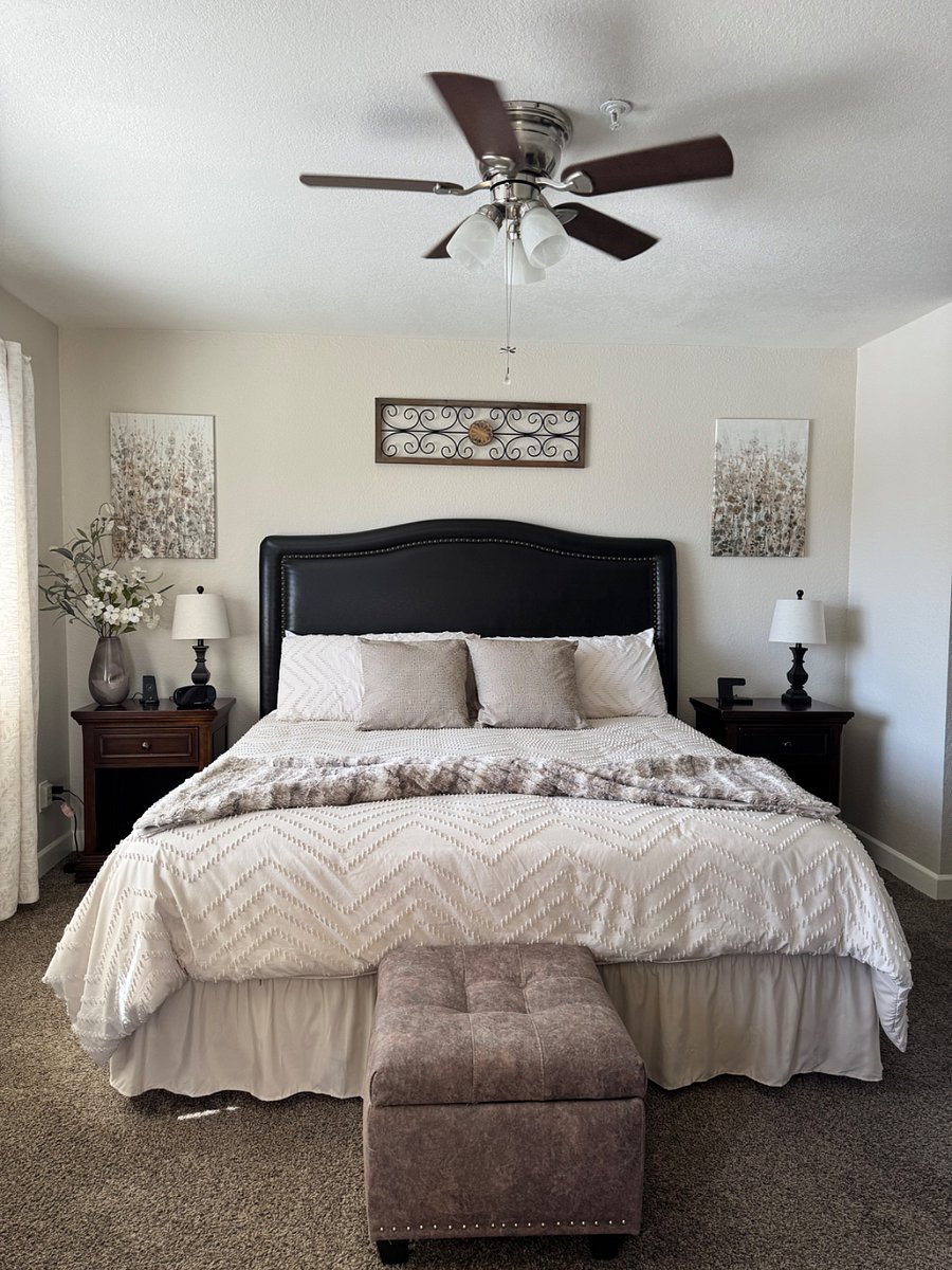 King bed in large primary bedroom