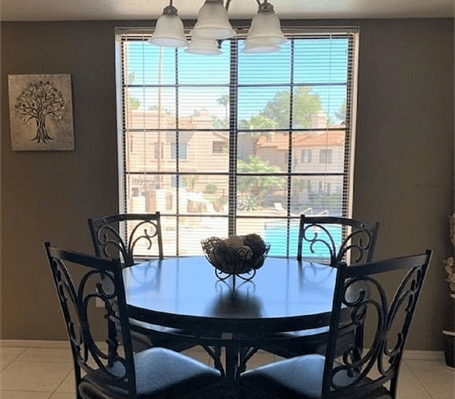 Dining area overlooking pool