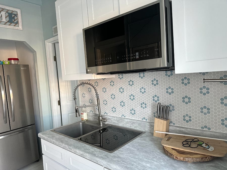 Currently remodeled; just added new backsplash and white porcelain floors.