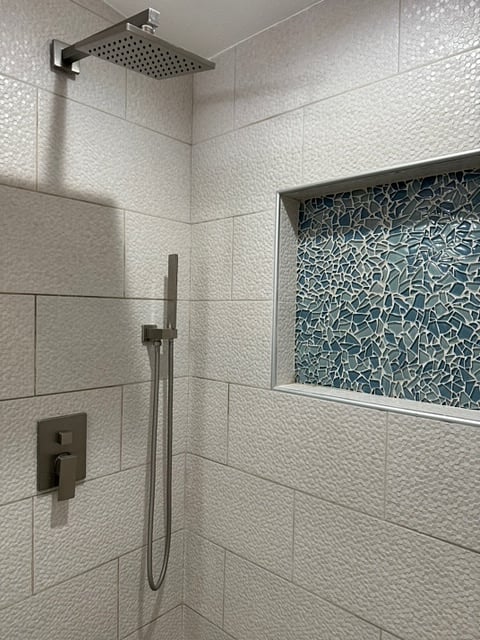 Classy open and light HUGE rainfall shower with amazing mosaic tile and overhead showers with SO much room. 
